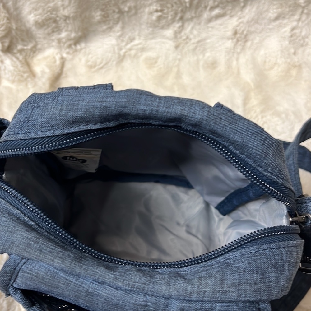 Lug crossbody. Looks like denim. Adjustable strap - Picture 8 of 15